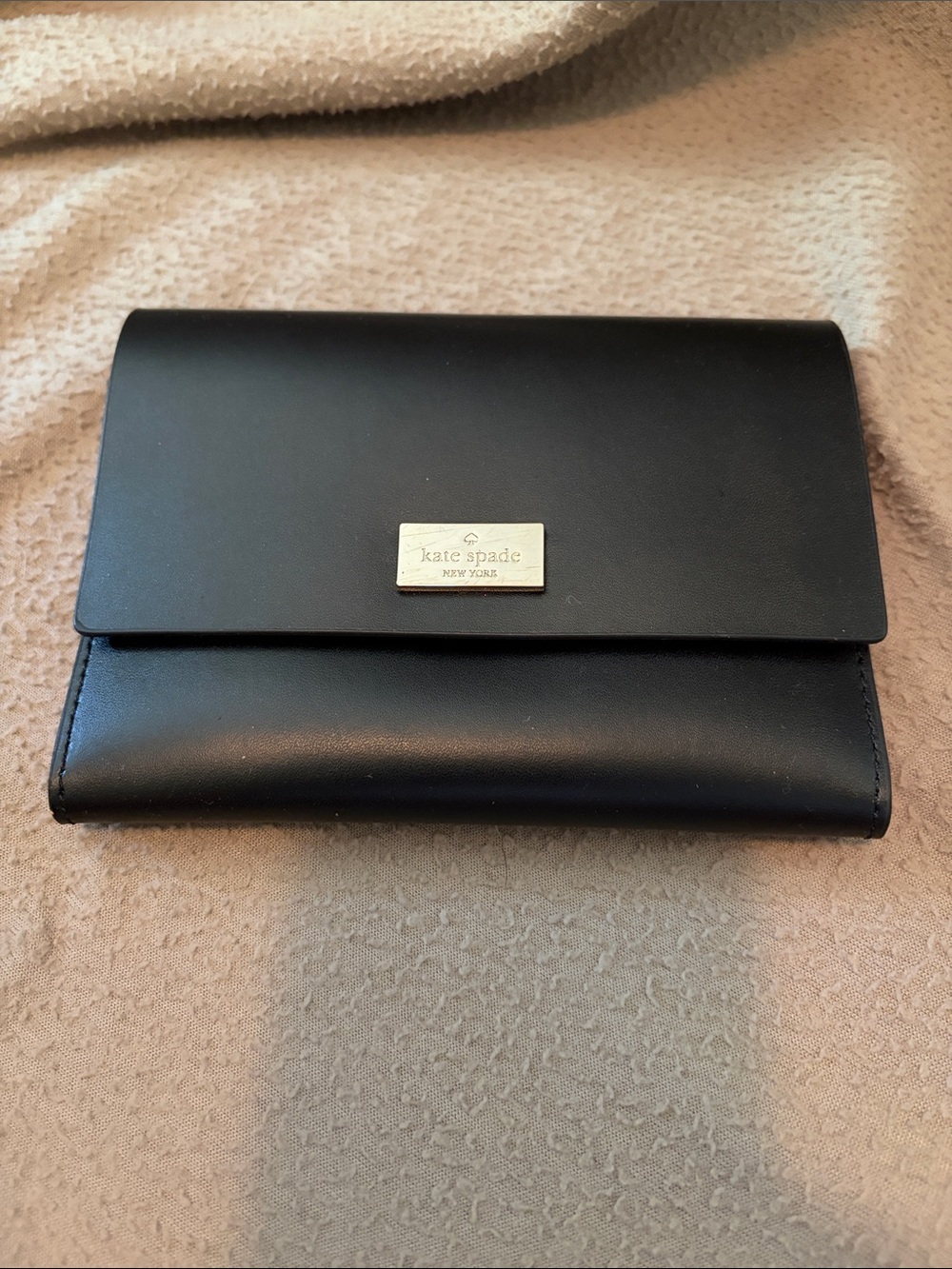 kate spade Black Leather Foldover Wallet with Gold Plaque